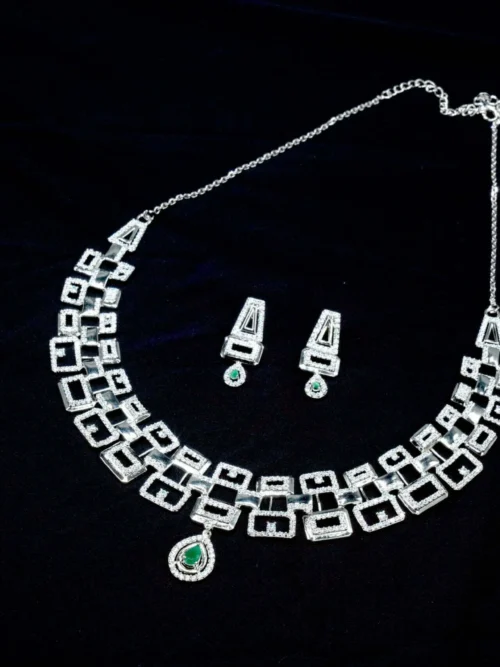 Cocktail box necklace set with green stone drop
