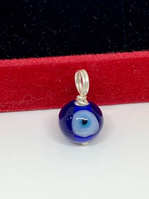 Evil eye silver bead pendant
