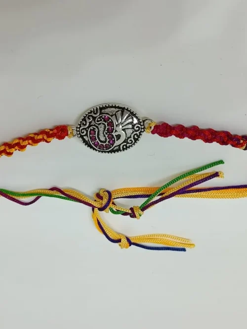 Om designed pure silver rakhi