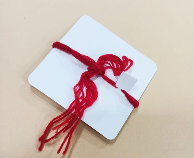 Silver Badam Design Rakhi - Image 4