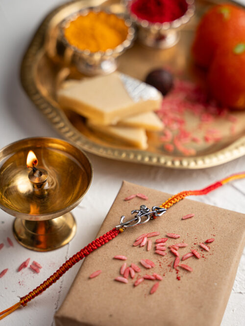 Silver Om With Trishul Rakhi
