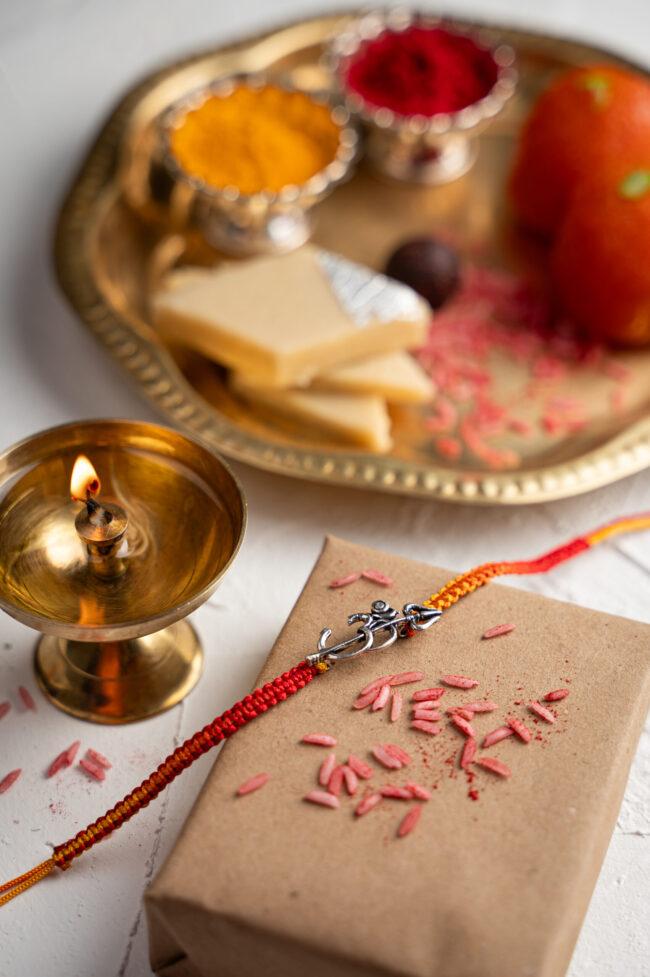 Silver Om With Trishul Rakhi