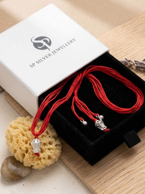 silver rakhi