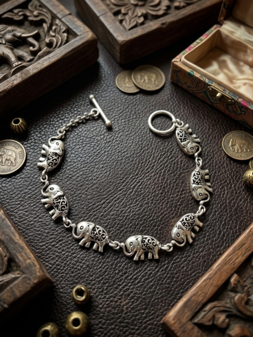 92.5 Sterling Silver Dual Elephant Link Bracelet with Antique Elephant Design
